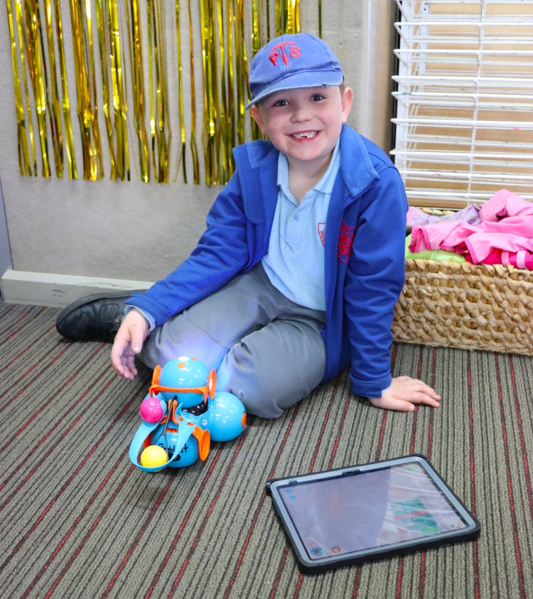 Student enjoying Tech Club.