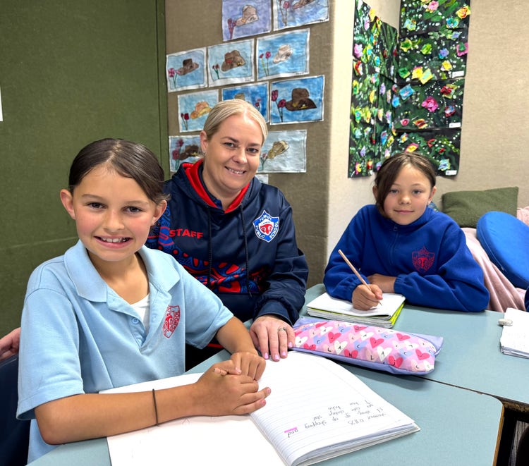 SLSO helping students with their learning.