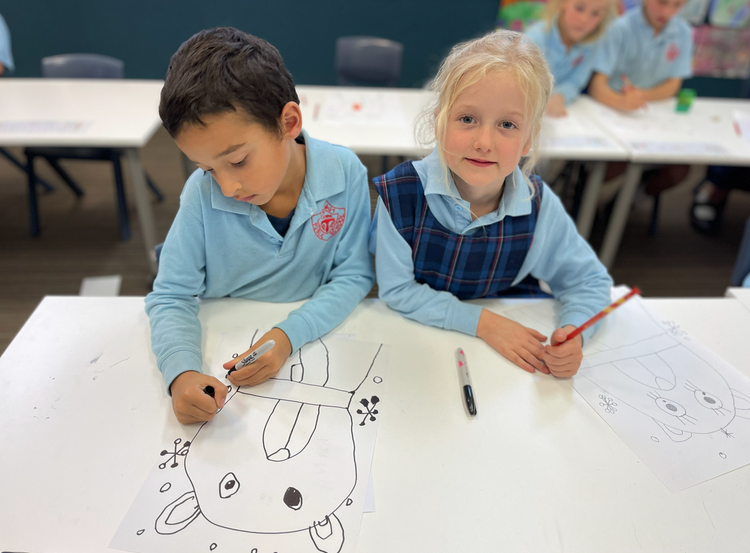 Students drawing in class.