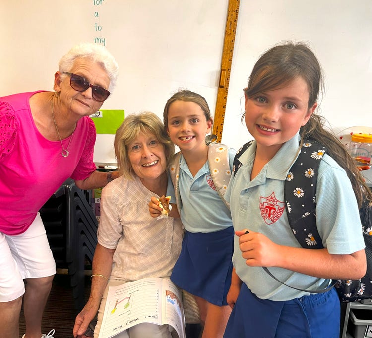 Students with their grandparents at Open Classrooms.
