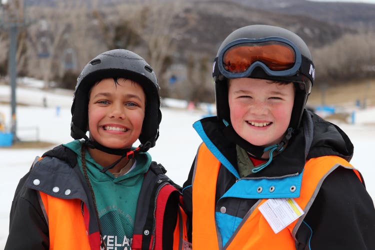 Students smiling at the Stage 3 ski excursion.